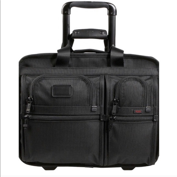 tumi travel handbag
